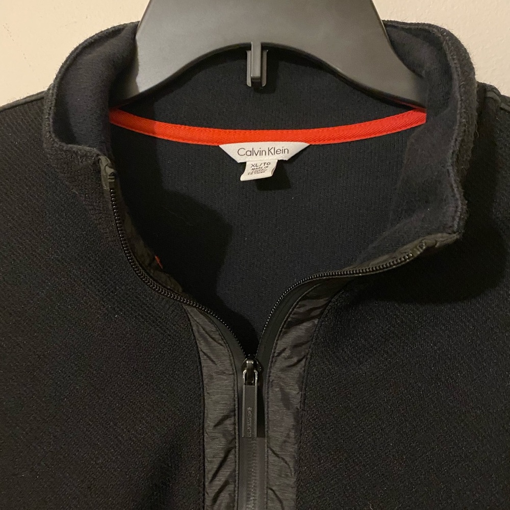 Black Calvin Klein pull over.